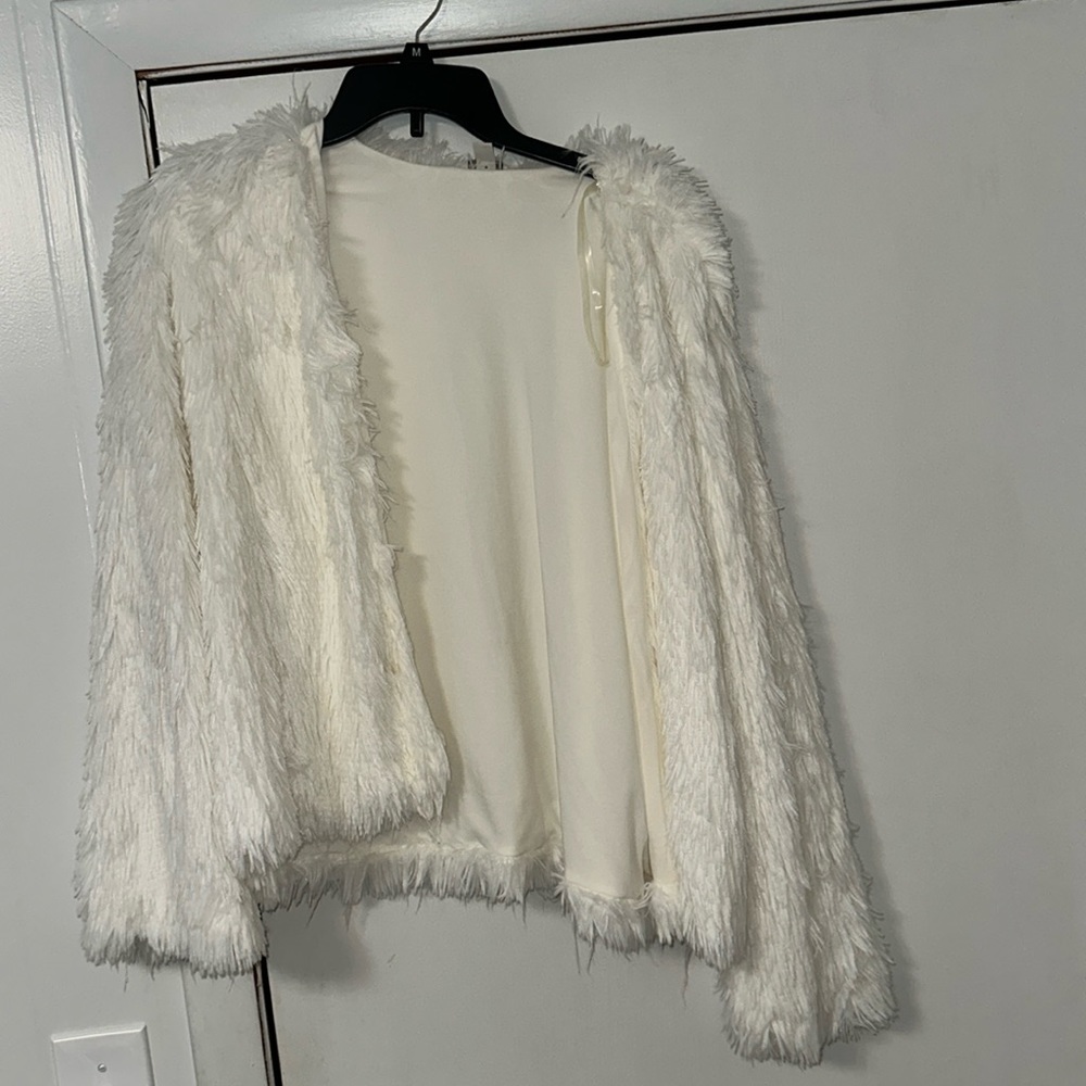 White fuzzy jacket/cardigan. No stains. Great condition.